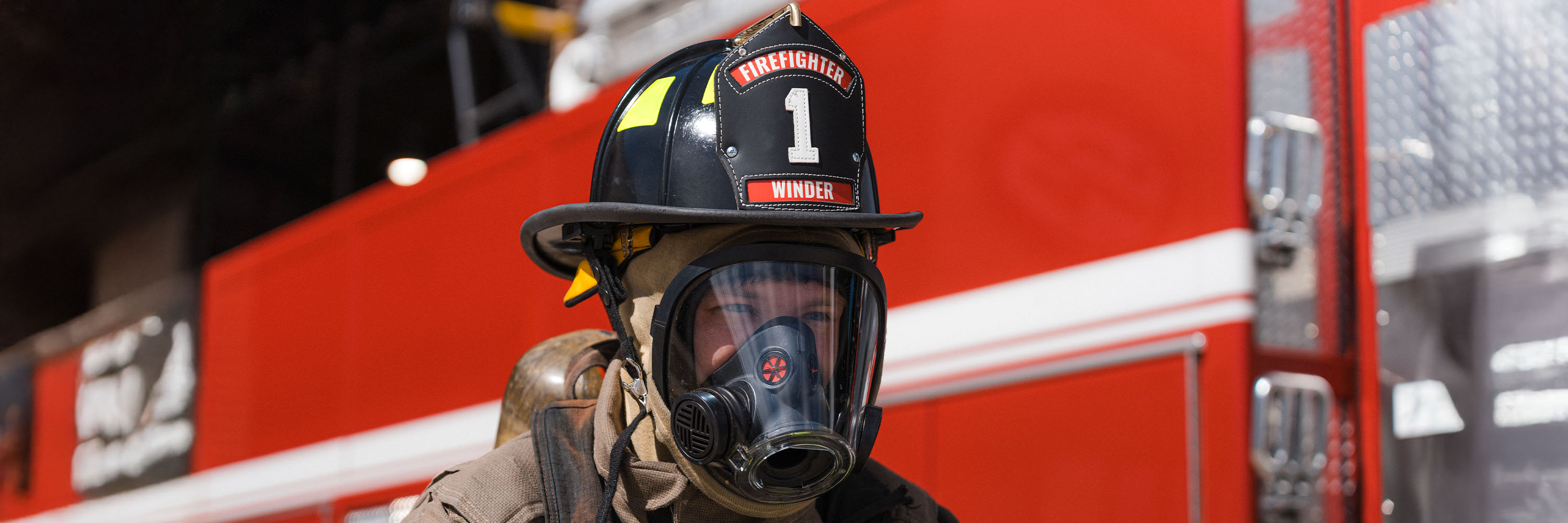 Firefighter wearing helmet