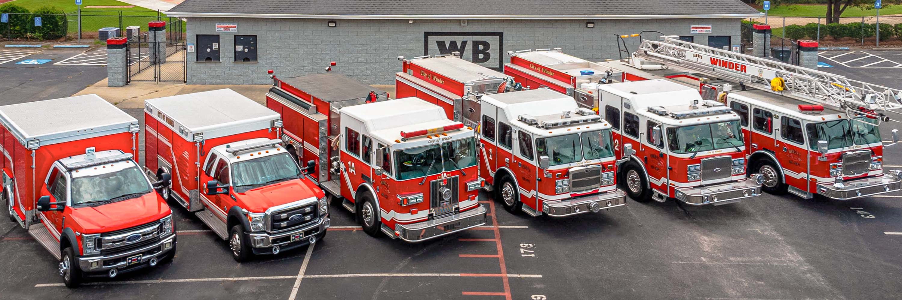 Winder Firetrucks lined up in the high school parking lot